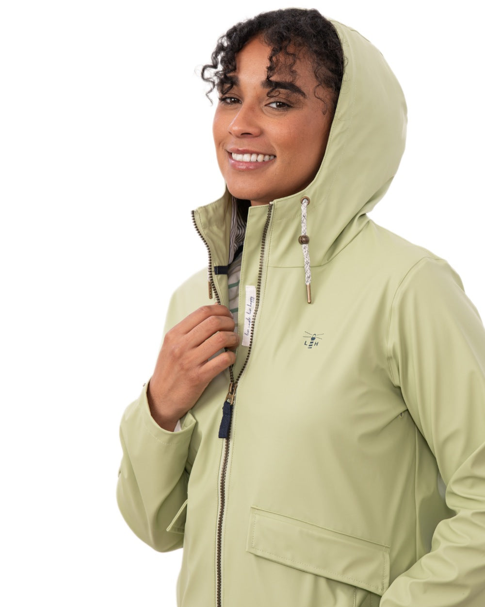 Pistachio coloured Lighthouse Ladies Lucy Jacket on white background 