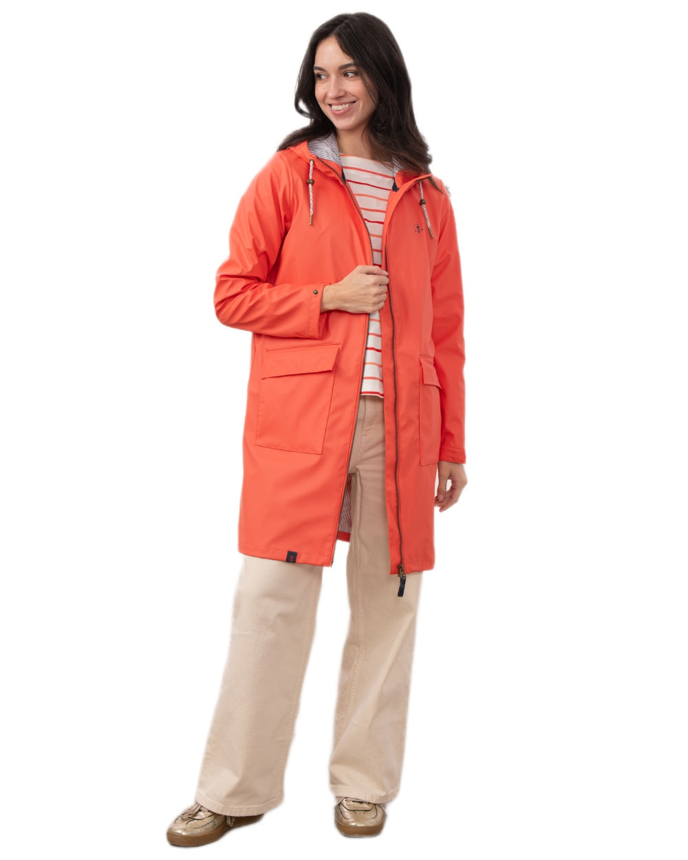Coral coloured Lighthouse Ladies Lucy Long Coat on white background 