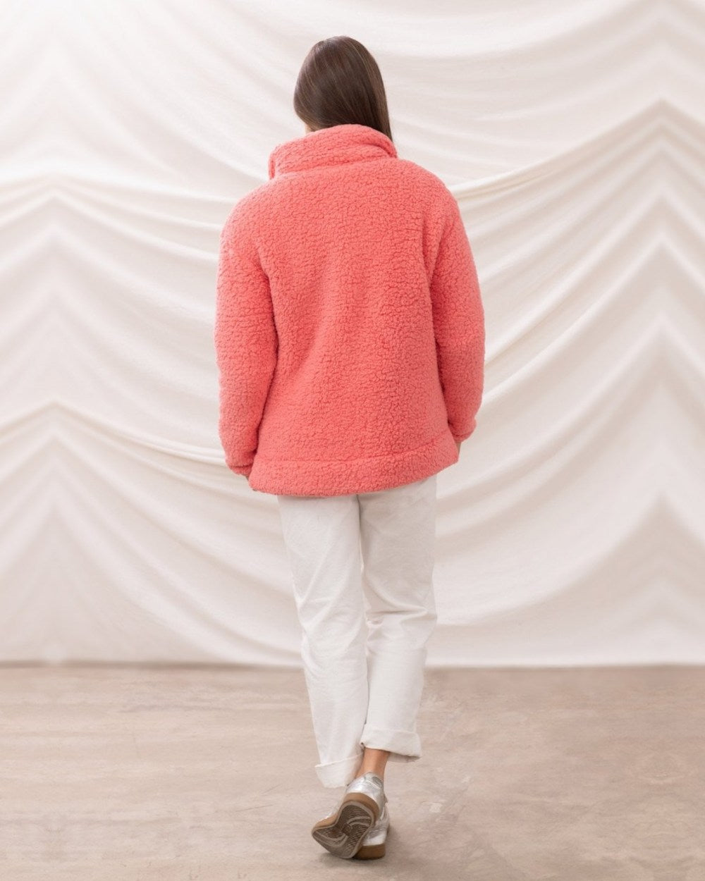 Sugar Coral coloured Lighthouse Ladies Seashell Full Zip Sherpa Fleece on curtain background 