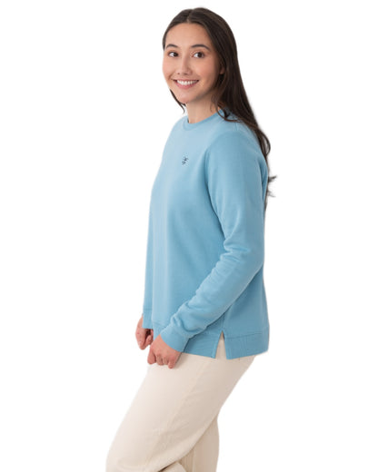 Blue coloured Lighthouse Ladies Seaside Jersey on white background 