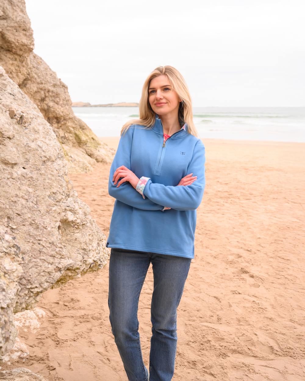 Marine Blue coloured Lighthouse Ladies Shore Sweatshirt on beach background 