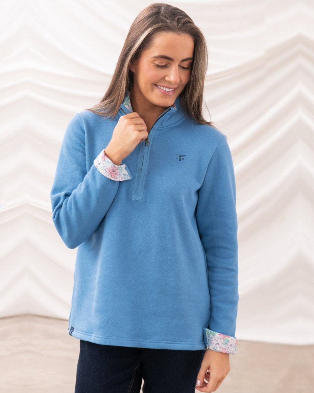 Marine Blue coloured Lighthouse Ladies Shore Sweatshirt on curtain background 