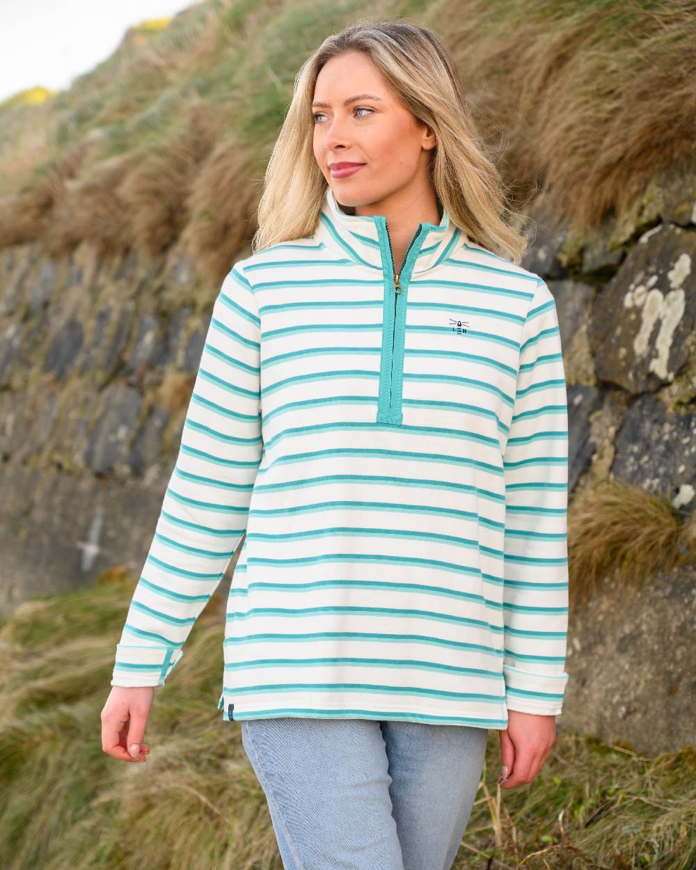 Soft Teal Stripe coloured Lighthouse Ladies Shore Sweatshirt on mountain background 
