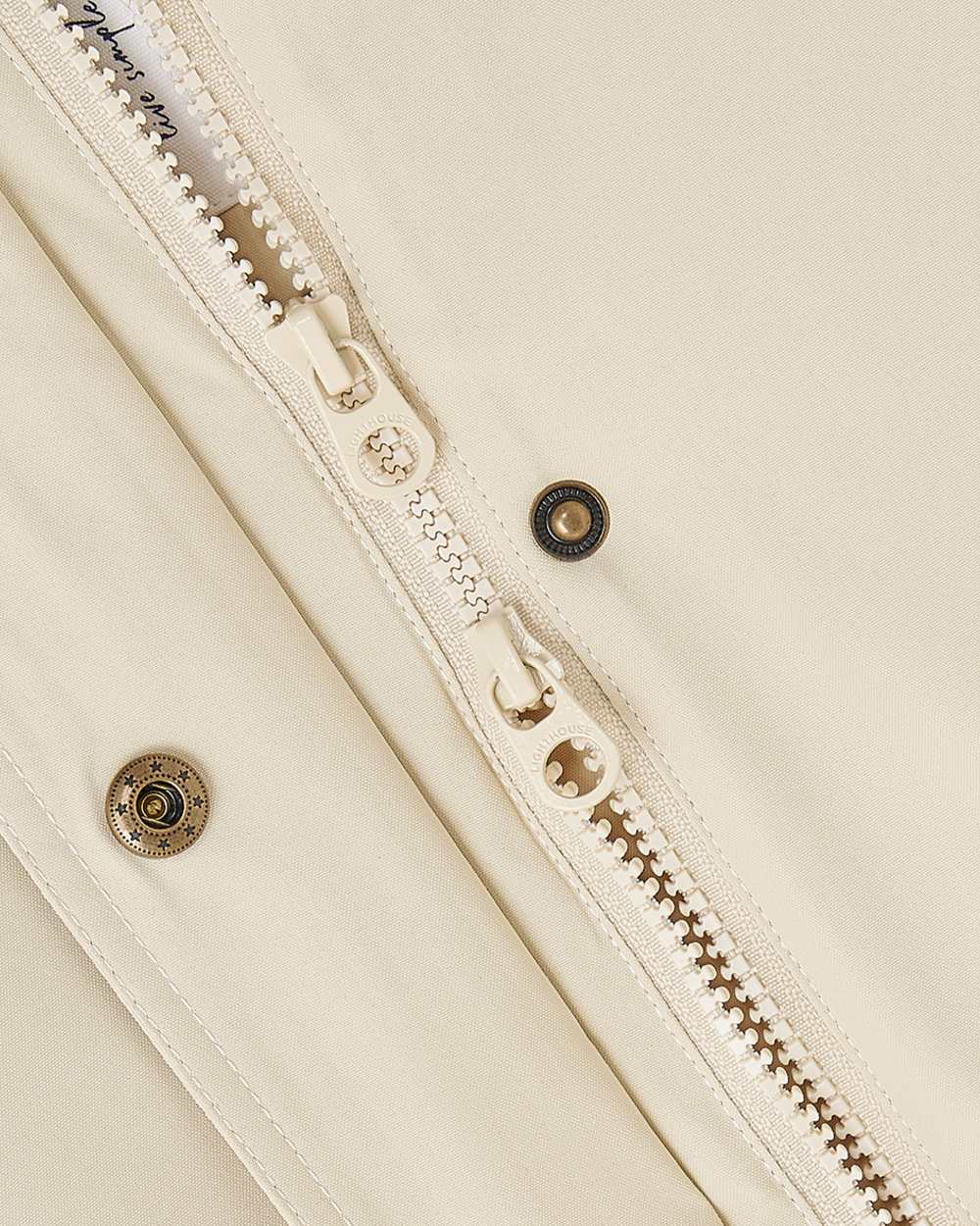 Cream coloured Lighthouse Ladies Tess Coat on white background 