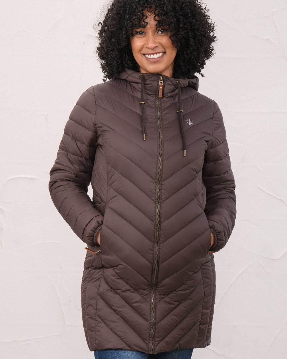 Cocoa Coloured Lighthouse Laurel Ladies Coat on wall background 