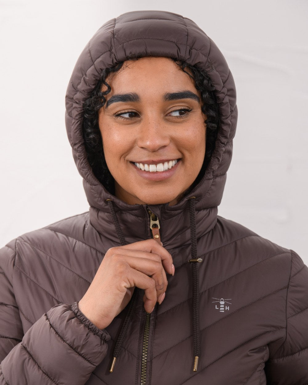 Cocoa Coloured Lighthouse Laurel Ladies Coat on wall background 