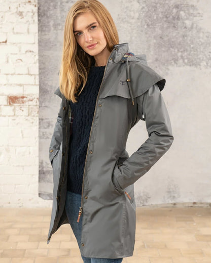 Urban Grey coloured Lighthouse Outrider 3-4 Length Ladies Waterproof Raincoat - Clearance Colours on wall background 