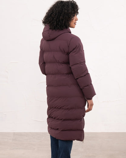 Damson coloured Lighthouse Savannah Coat on wall background 