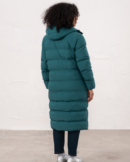 Pine coloured Lighthouse Savannah Coat on wall background 