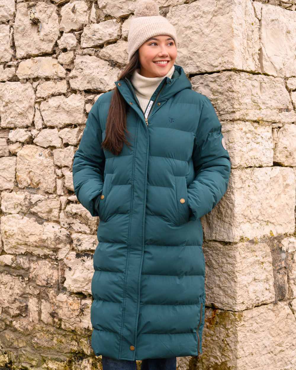 Pine coloured Lighthouse Savannah Coat on rock wall background 