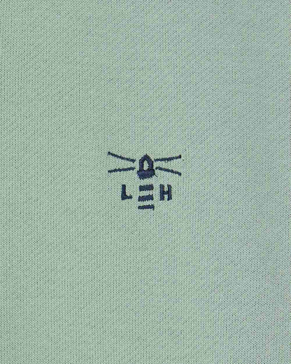 Sage coloured Lighthouse Shore Jersey Top on white background 