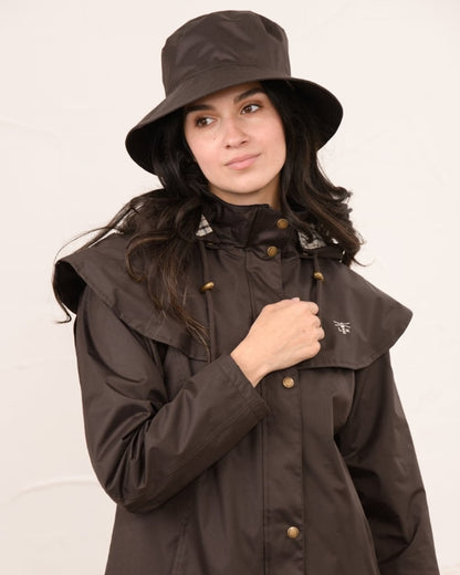 Chocolate coloured Lighthouse Storm Waterproof Hat on wall background 