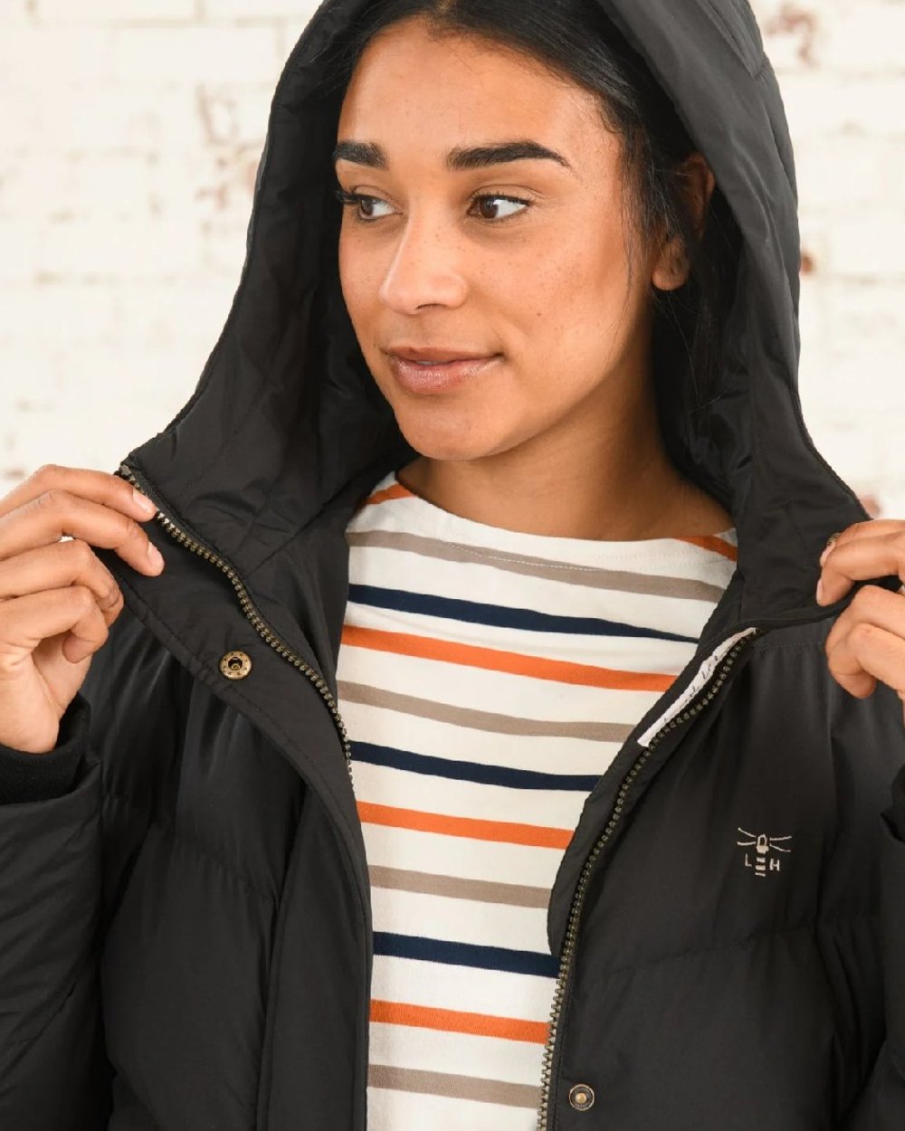 Black coloured Lighthouse Savannah Coat on wall background 