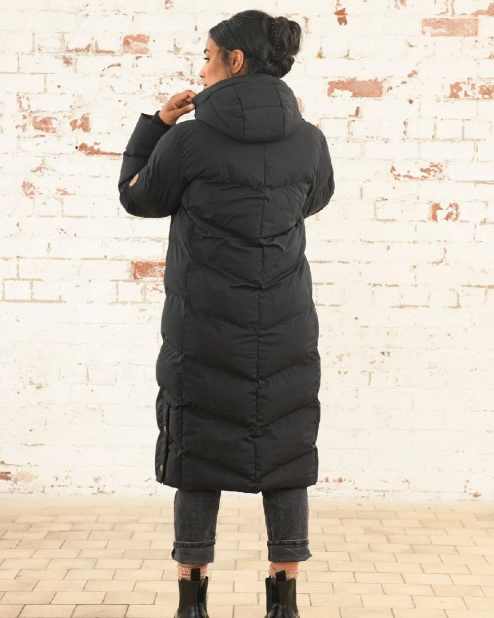 Black coloured Lighthouse Savannah Coat on wall background 