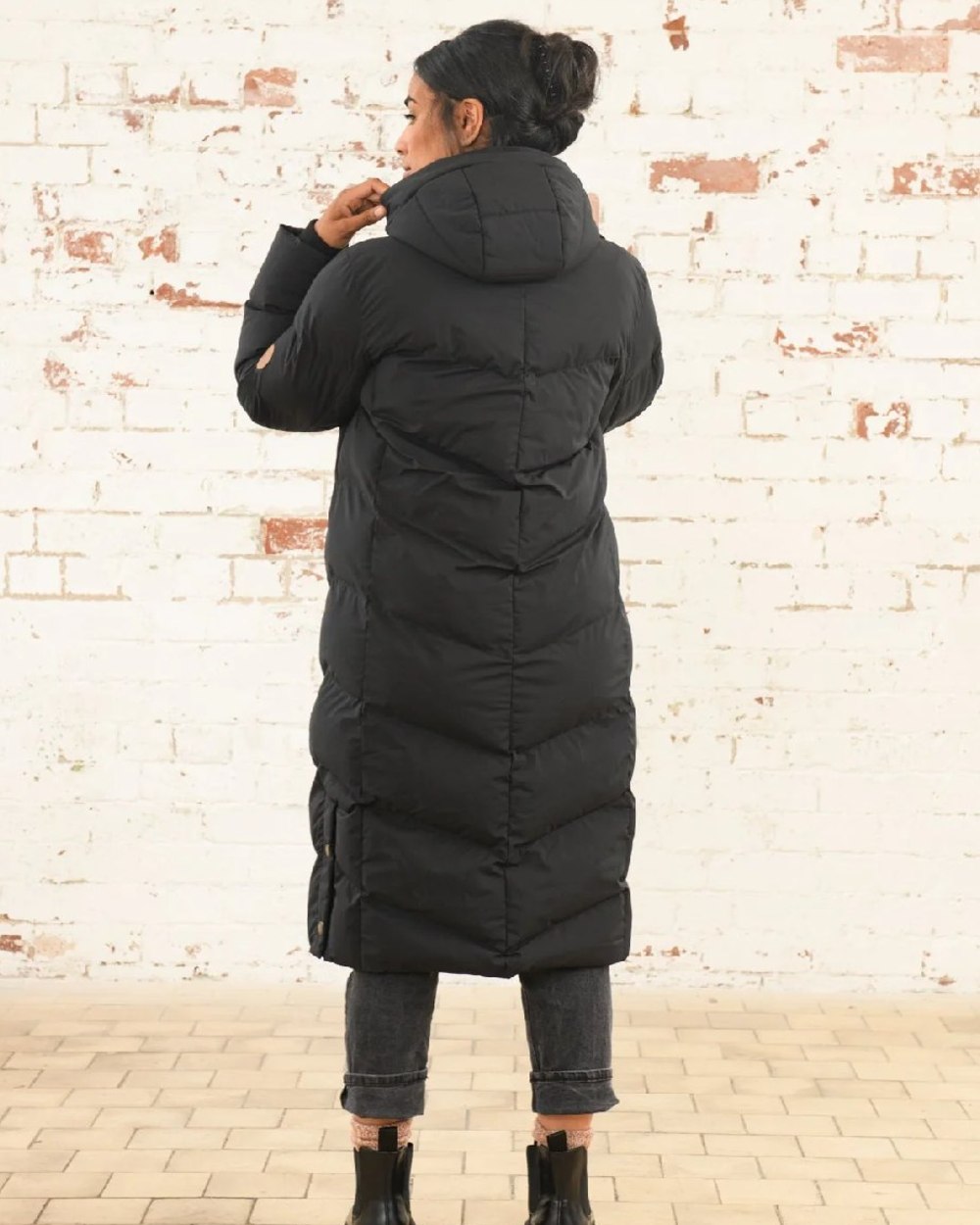Black coloured Lighthouse Savannah Coat on wall background 