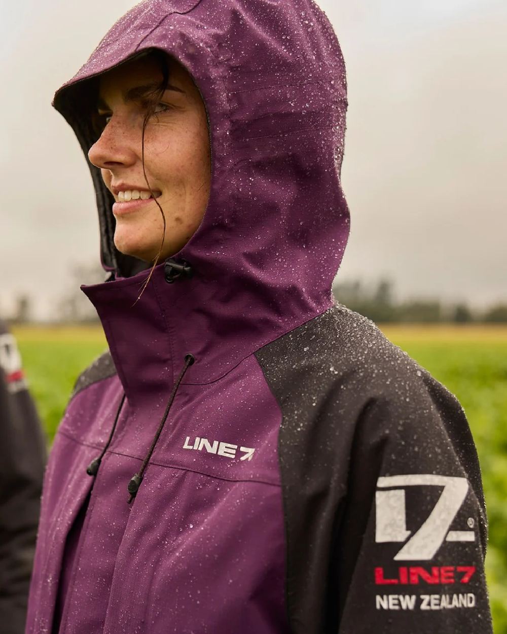 Blackberry Black Colour Line 7 Womens Territory Storm Pro20 Waterproof Jacket on blurry background 