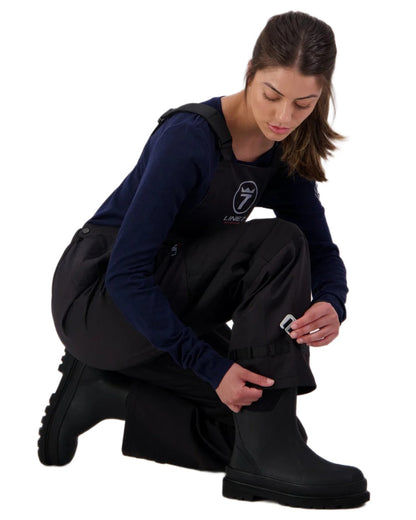 Black coloured Line 7 Womens Storm Pro 20 V2 Waterproof Bib Overtrousers on white background 