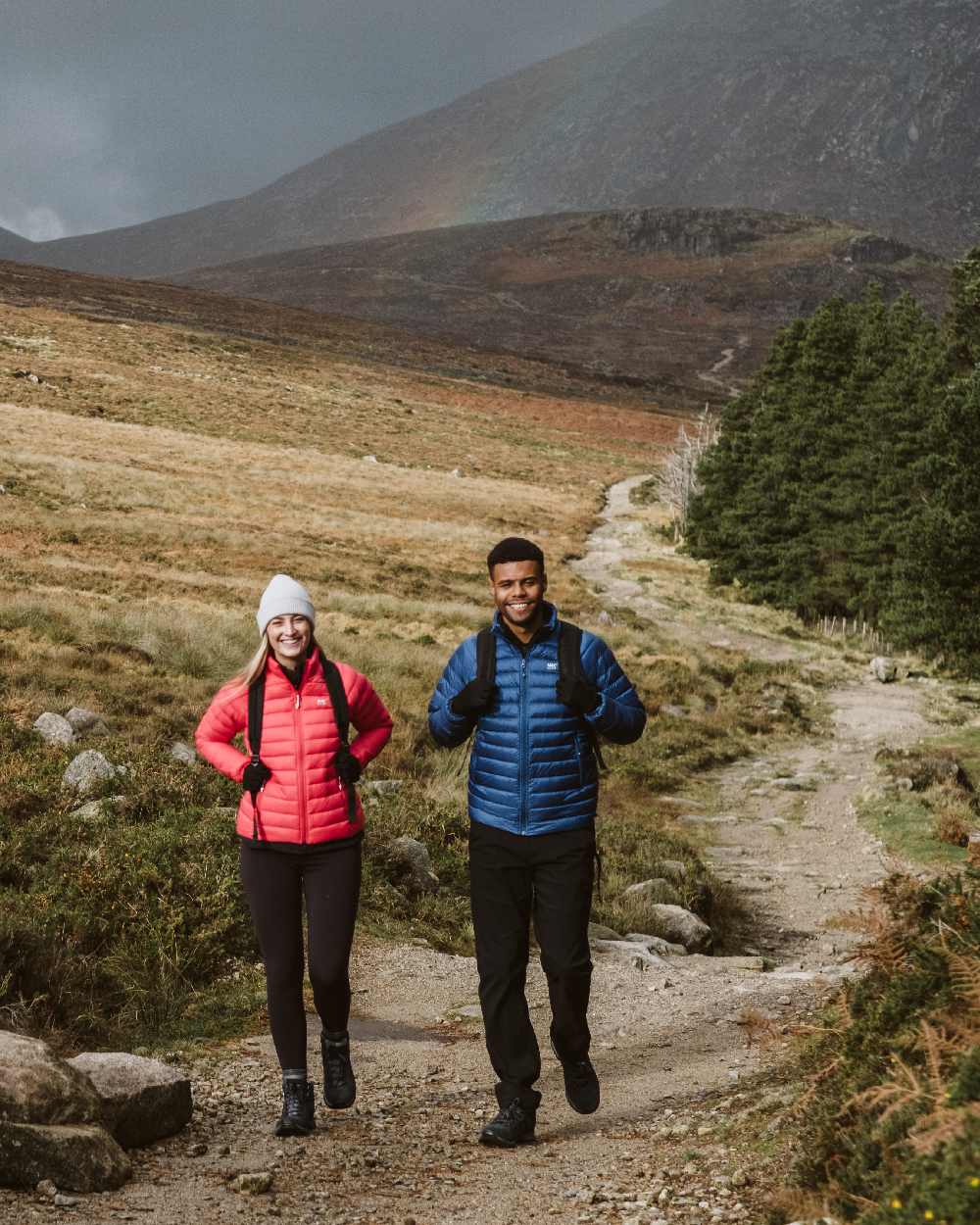 Blue Coloured Mac In A Sac Mens Synergy Jacket on mountain background 