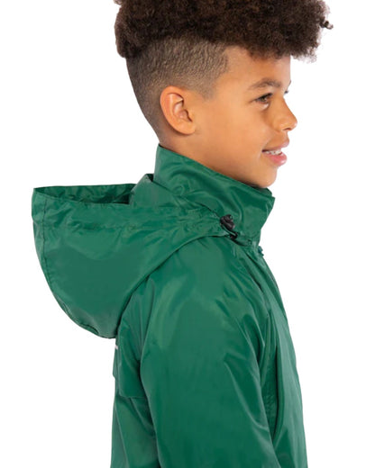 Bottle Green coloured Mac In A Sac Origin Childrens Mini Packable Waterproof Jacket on white background 