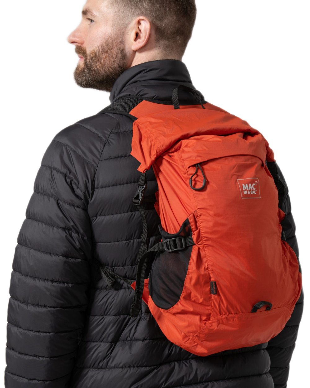 Burnt Orange coloured Mac In A Sac Travelite Packable Waterproof Backpack on white background 