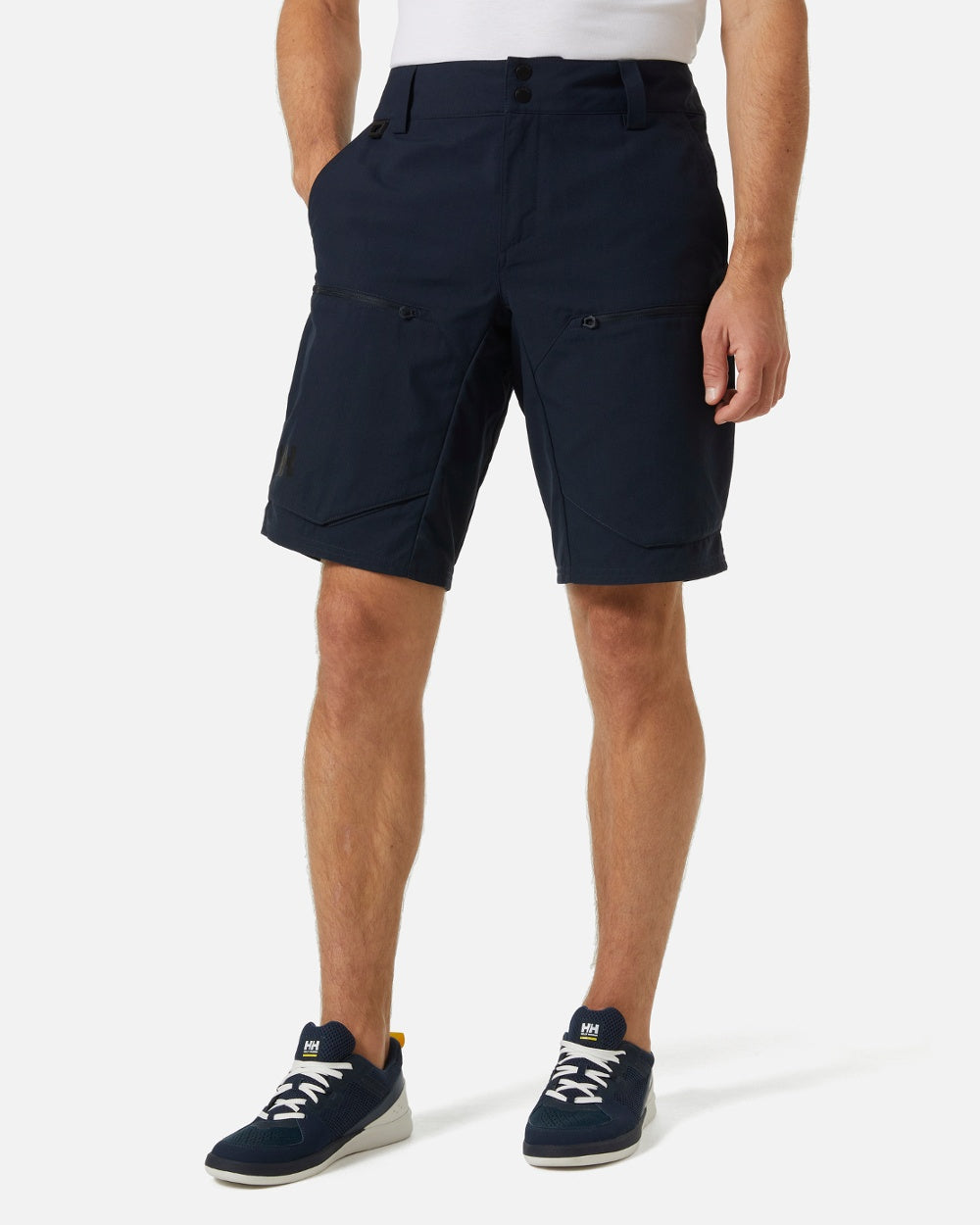 Navy coloured Helly Hansen Mens Crewline Cargo Shorts 2.0 on grey background 