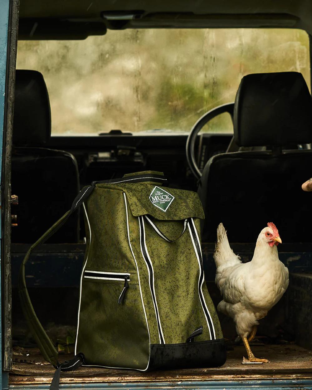 Moss coloured Muck Boot Wellington Boot Bag in boot of a farmers car