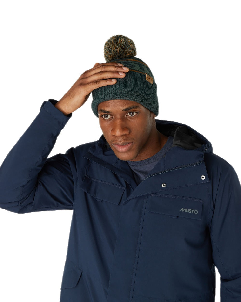 Darkest Spruce Coloured Musto Bobble Hat on white background 