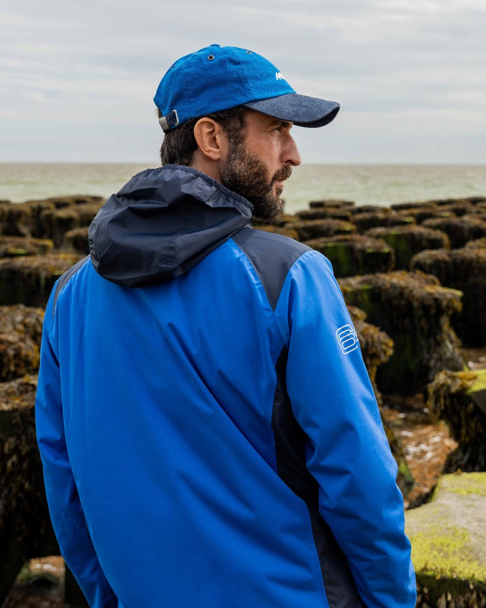 Aruba coloured Musto Essential Fast Dry Crew Cap on outdoor background 