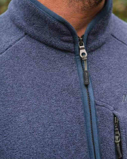 Navy Coloured Musto Fenland Polartec Fleece Vest on outdoor background 