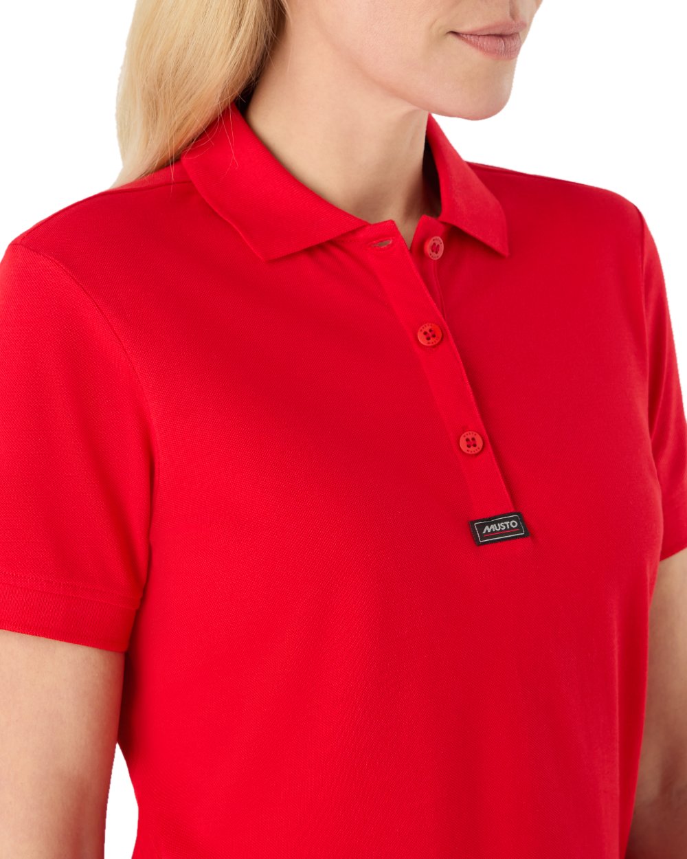 True Red Coloured Musto Ladies Essential Pique Polo Shirt on white background 

