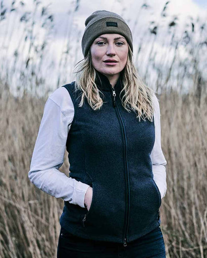 Navy Coloured Musto Ladies Fenland Polartec Vest on outdoor background 