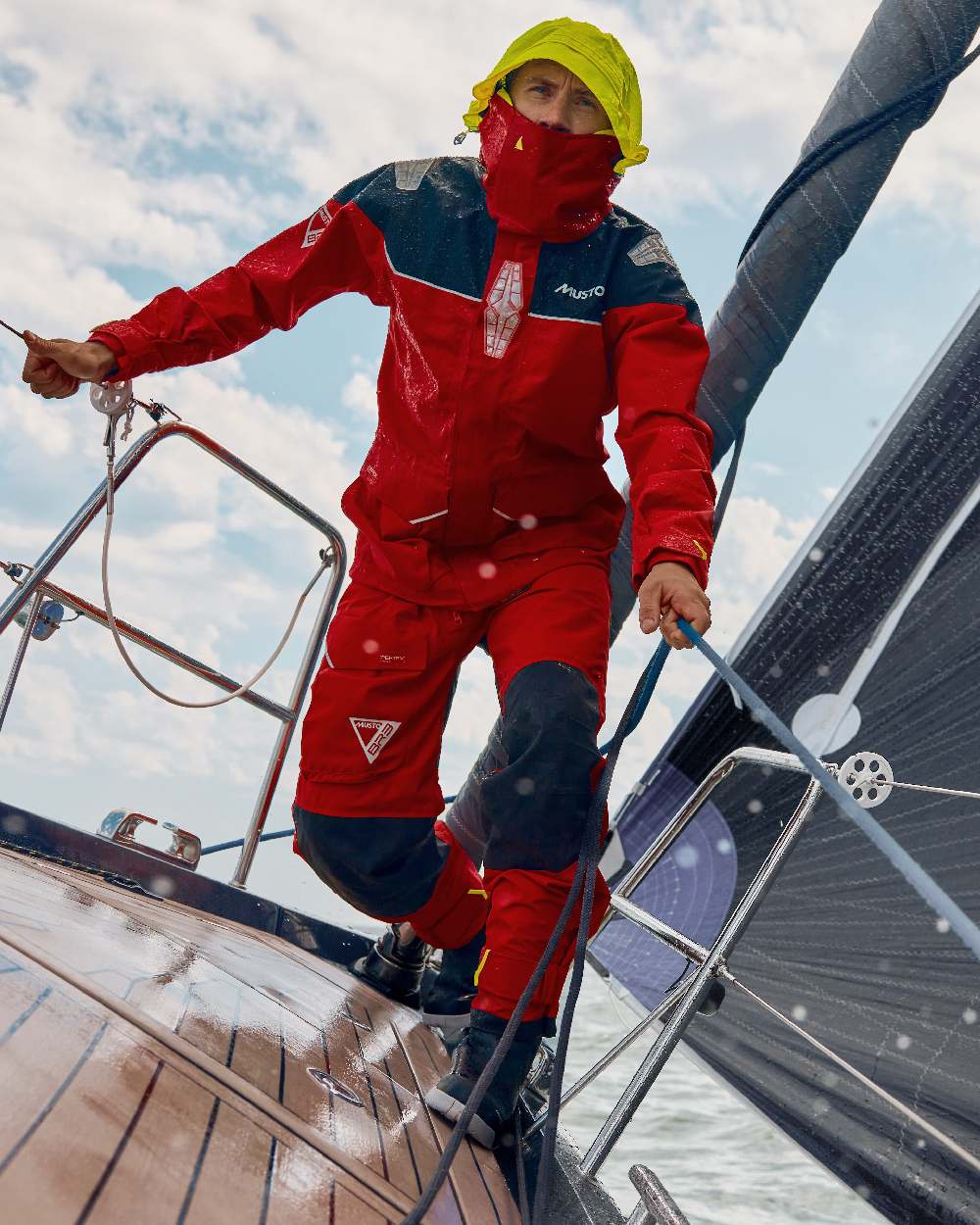 True Red coloured Musto Mens BR3 Pertex Offshore Jacket on sky background 