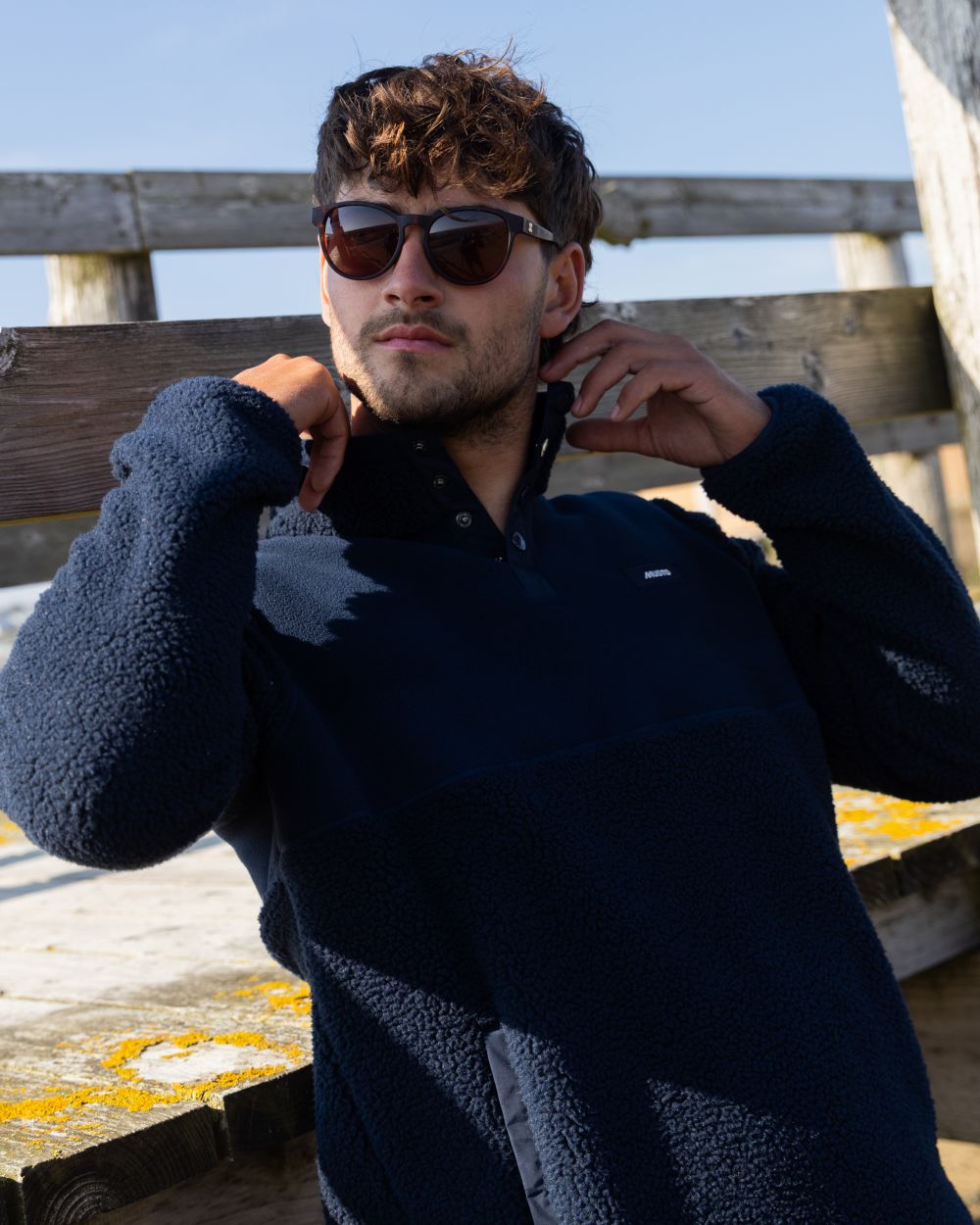Navy Coloured Musto Mens Cover Deep Pile Fleece Jacket on outdoor background 