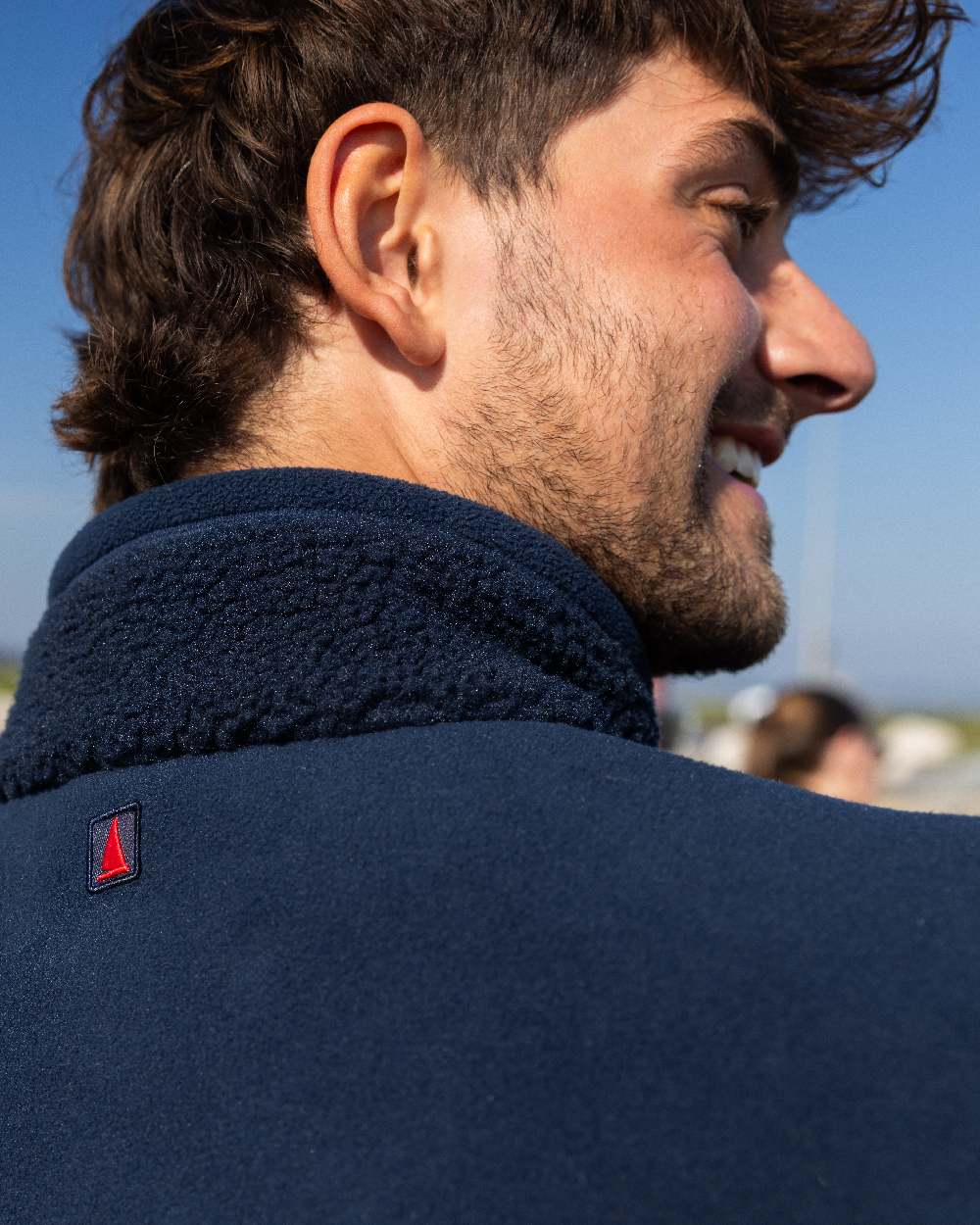 Navy Coloured Musto Mens Cover Deep Pile Fleece Jacket on outdoor background 