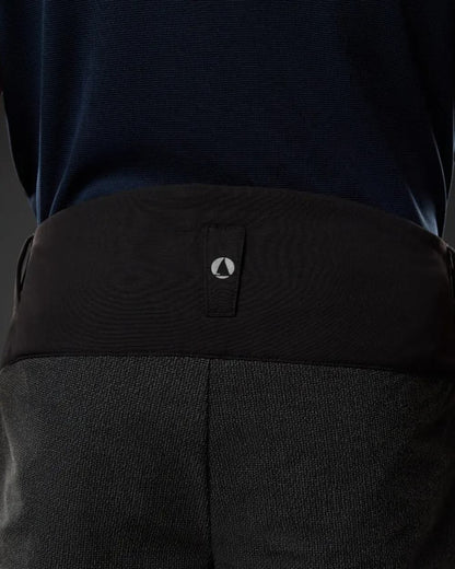 Black Coloured Musto Mens Evo Performance Stretch Shorts on studio background 