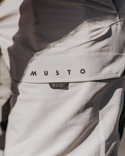 Platinum Coloured Musto Mens Evo Performance Stretch Shorts on outdoor background 
