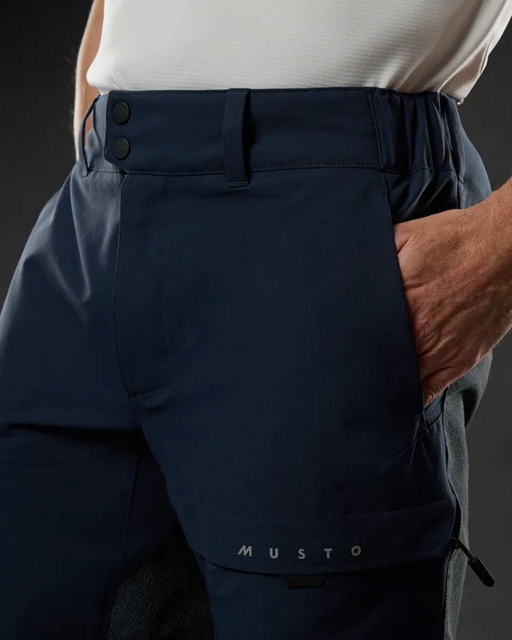 True Navy Coloured Musto Mens Evo Performance Stretch Shorts on studio background 