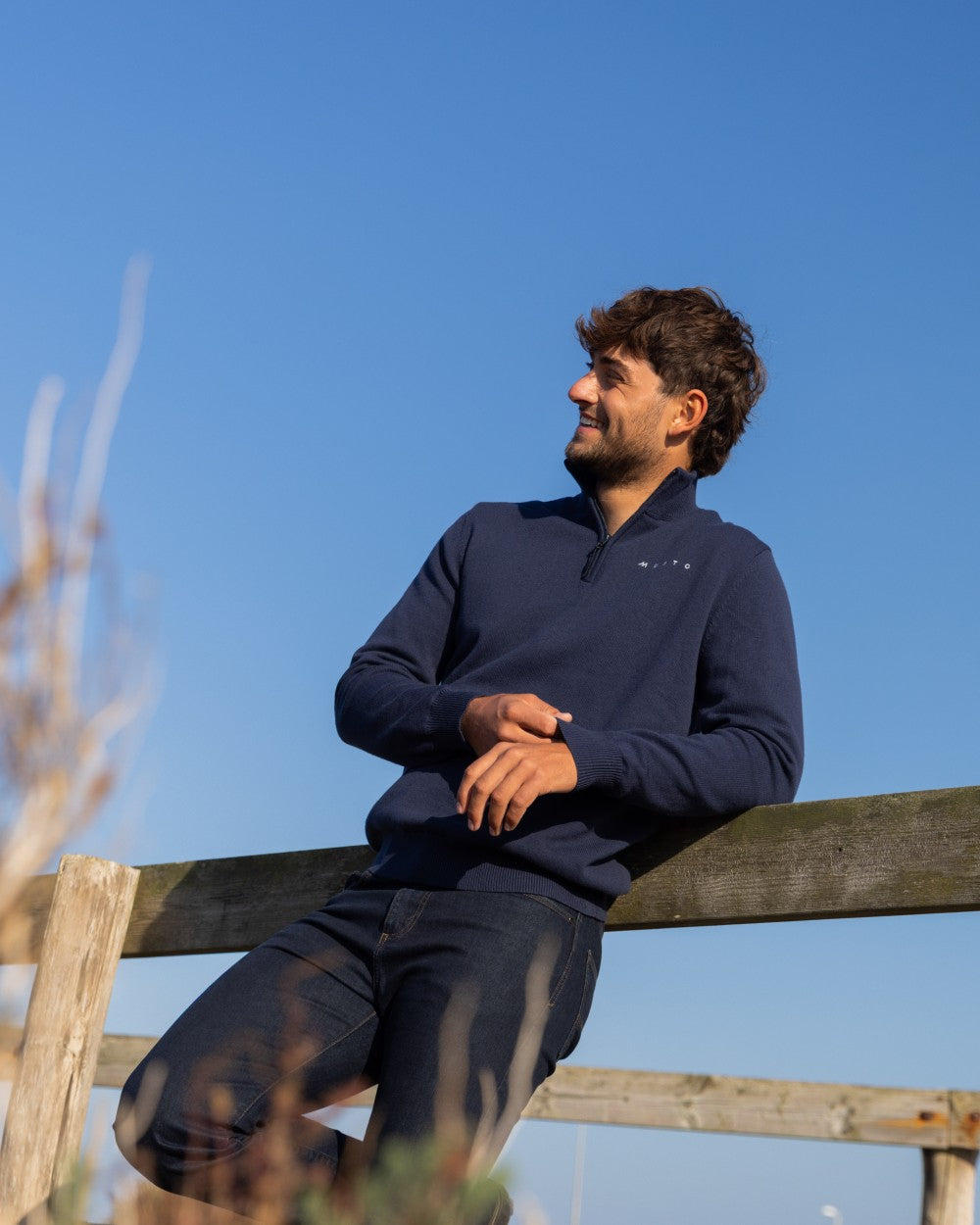 Navy Coloured Musto Mens Evo Windproof Knit Jacket on outdoor background 