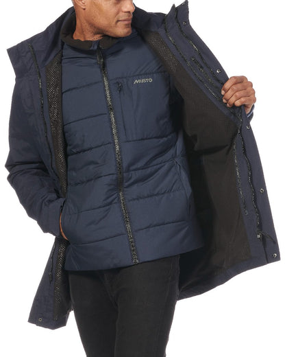 Navy coloured Musto Mens Marina Primaloft 3 in 1 Parka on white background 