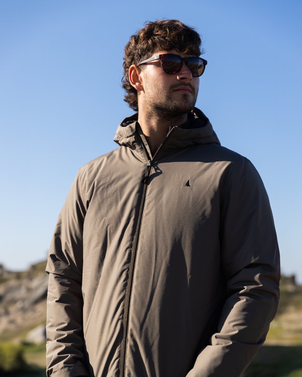 Crocodile Coloured Musto Mens Original Insulated Waterproof Jacket on outdoor background 