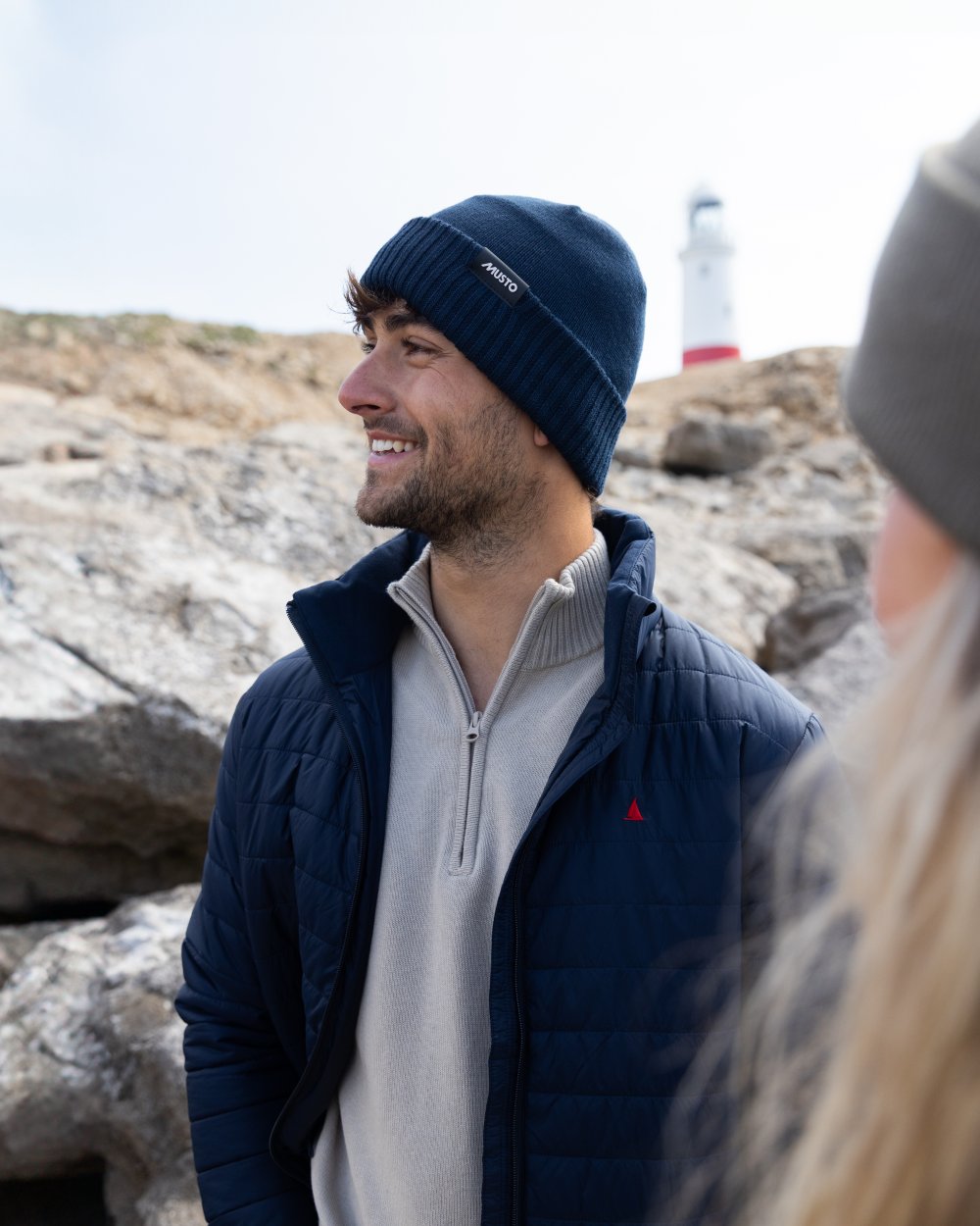Navy Coloured Musto Mens Original Lite Puffer Jacket on outdoor  background 