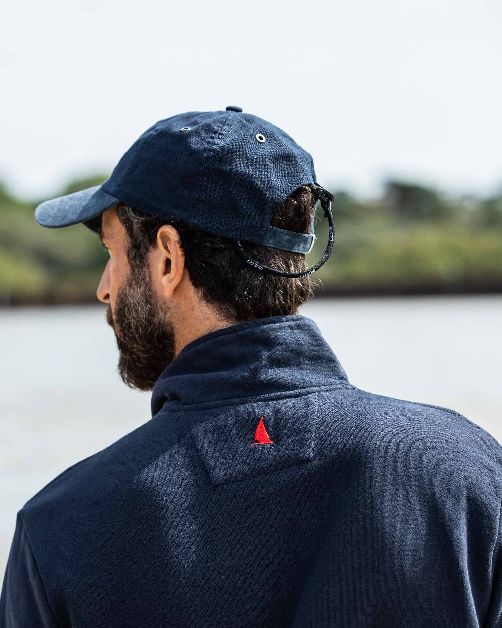 True Navy Coloured Musto Original Crew Cap on outdoor background 