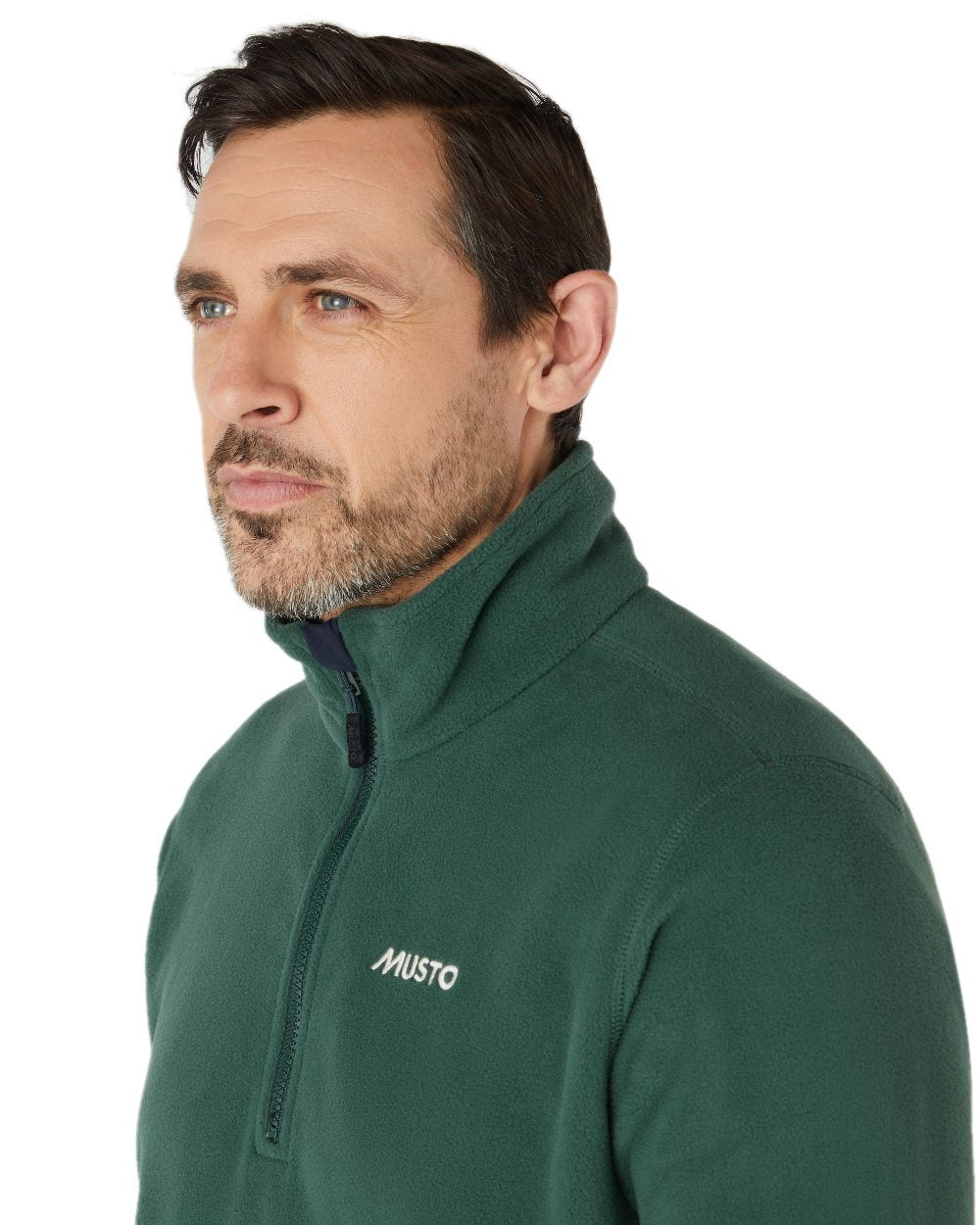 Darkest Spruce coloured Musto Snug Fleece 2.0 on white background 