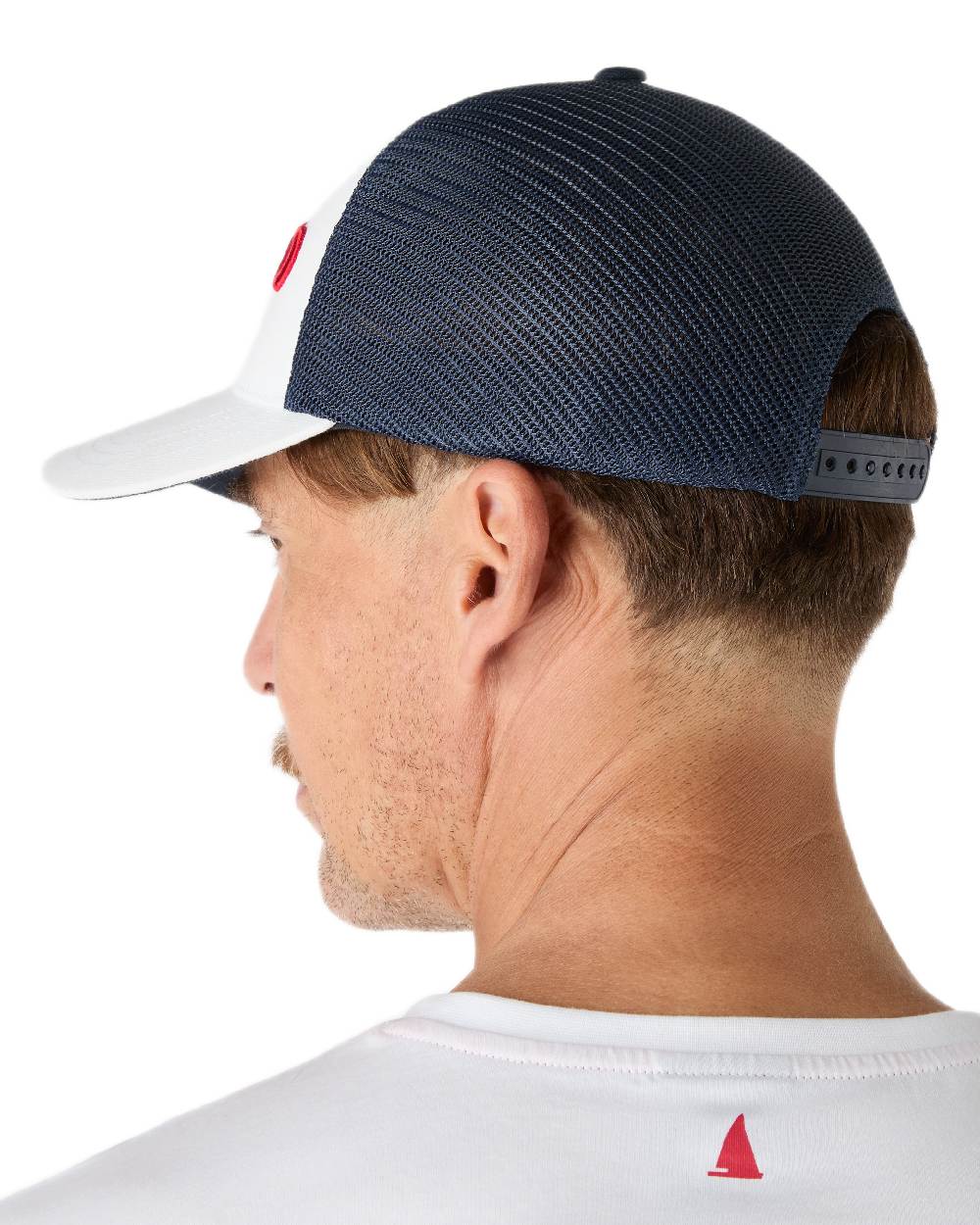 White Navy Coloured Musto Trucker Cap on white background 