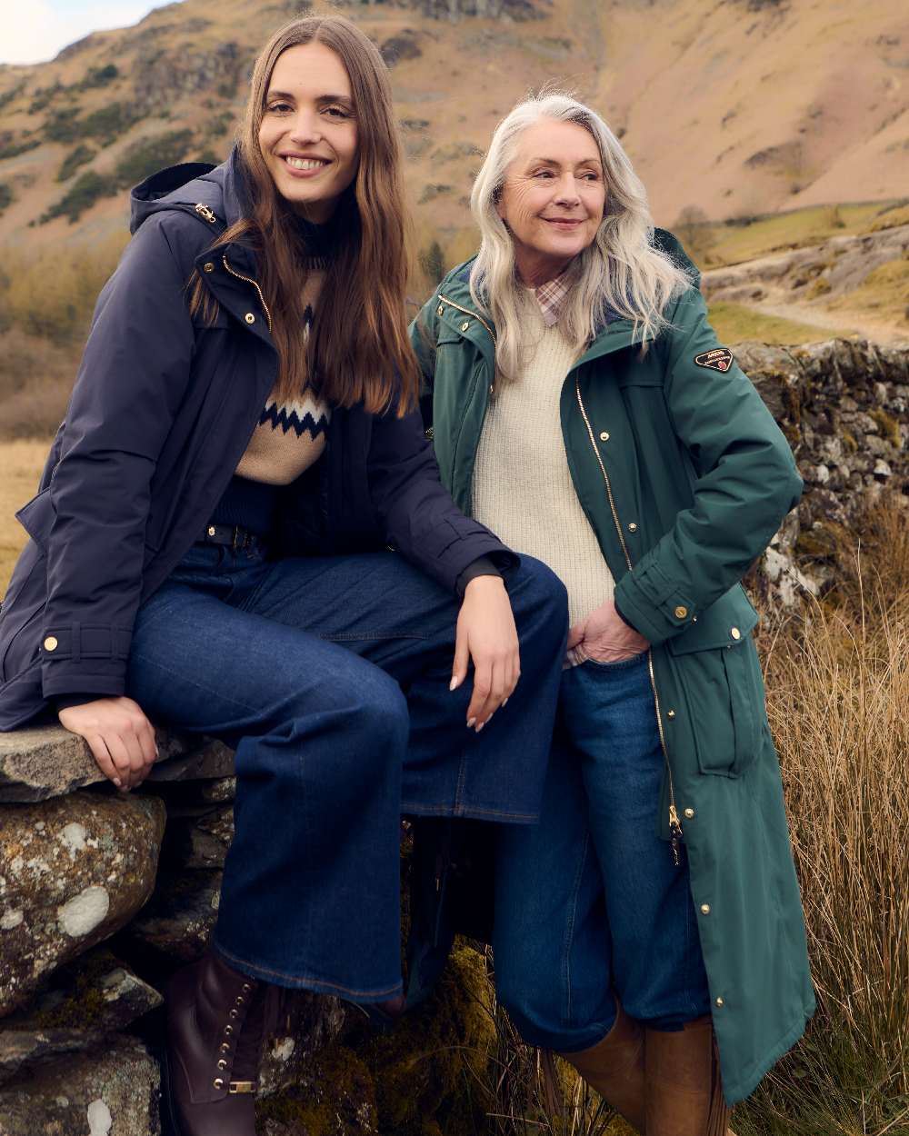 Darkest Spruce Coloured Musto Womens Odyssey Waterproof Coat on outdoor background 