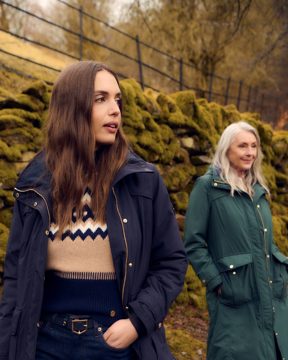 Darkest Spruce Coloured Musto Womens Odyssey Waterproof Coat on outdoor background 