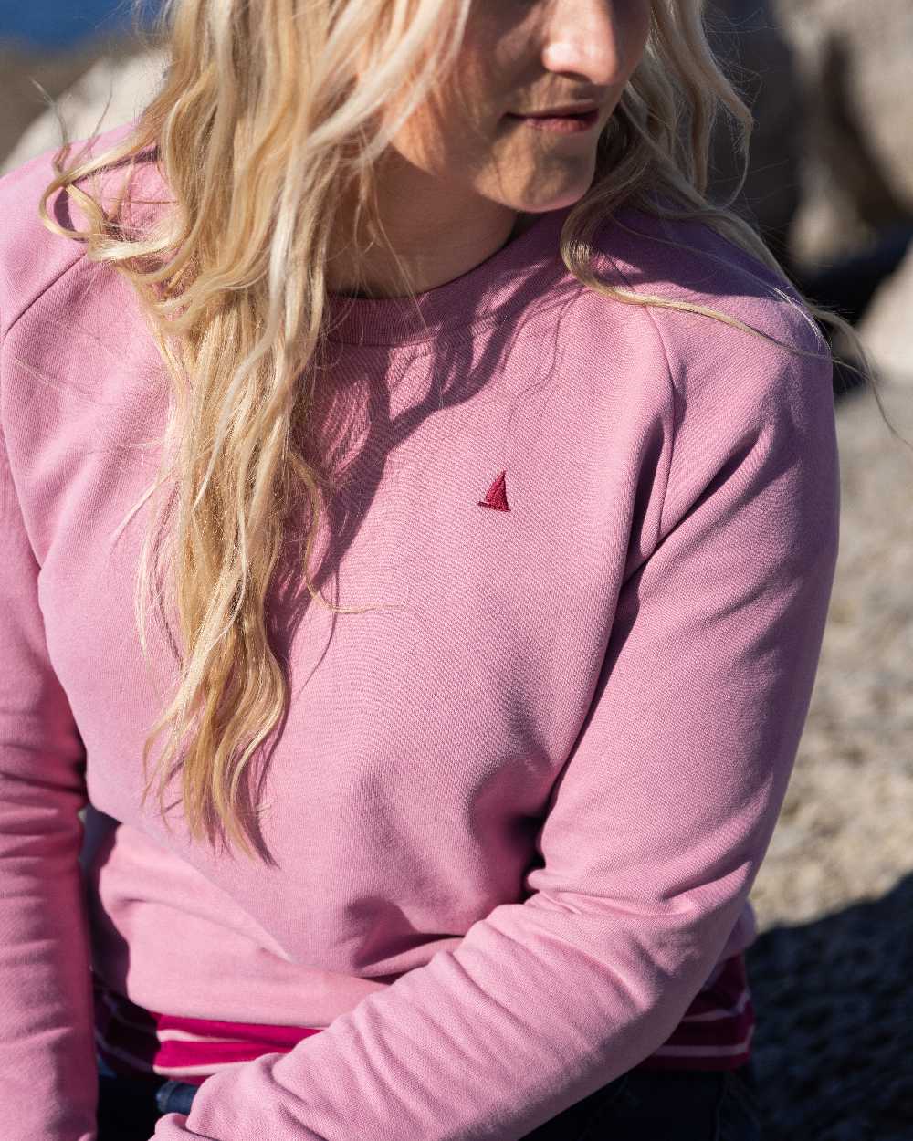 Oyster Pink Coloured Musto Womens Original Crew Sweater on outdoor background 