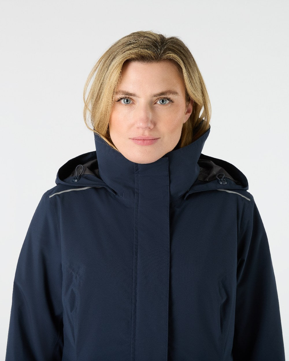 Navy Coloured Musto Womens Suffolk Waterproof Coat on White Background 