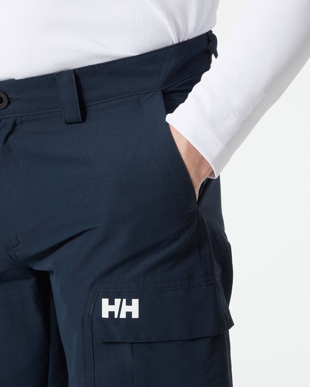 Navy coloured Helly Hansen Mens HH quick dry cargo pant on grey background 