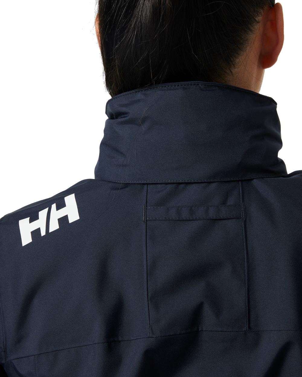 Navy coloured Helly Hansen womens crew hooded sailing jacket 2.0 on white background 